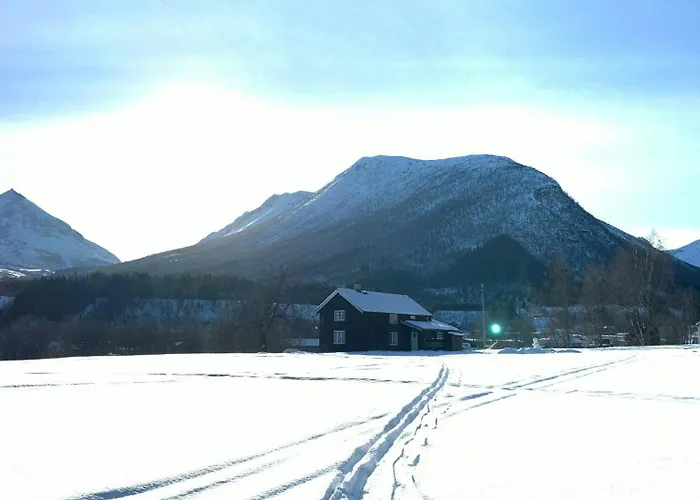 Historic Log House At The Foot Of Middagstind *